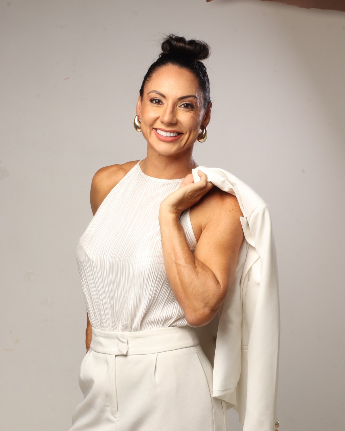 Dra. Clarissa Rios em retrato profissional